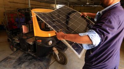 Workers at al-Shehab factory.