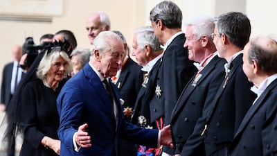 Officials welcome the monarch. Reuters
