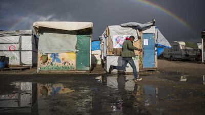 Rainbow over the migrant camp known as the Jungle in Calais, France on October 22, 2016, two days before it is to be demolished. in Calais, France. French authorities are preparing to clear the Jungle migrant and refugee camp on Monday. (Photo by Jack Taylor/Getty Images)