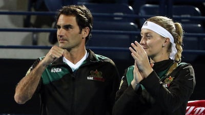 UAE Royals players Roger Federer and Kristina Mladenovic shown during their IPTL match on Tuesday night in Dubai. Karim Sahib / AFP / December 15, 2015