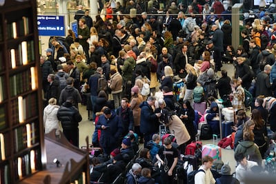Passengers wait at St Pancras International station, after high-speed services between London and Ebbsfleet were cancelled because of flooding in a tunnel under the Thames. PA