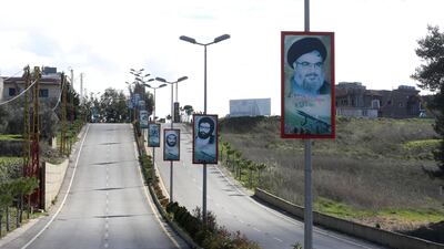 Hassan Nasrallah, depicted on posters along a road in Bint Jbeil, southern Lebanon, said Hezbollah had improved its air defence capabilities. Reuters