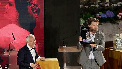 Nikolaj Coster-Waldau picks up his award on stage. Getty Images