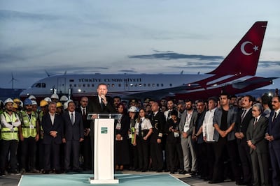 Turkish President Recep Tayyip Erdogan makes a speech after the first landing of his plane at Istanbul's new airport on June 21, 2018. AFP