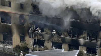 An aerial view shows firefighters battling the blaze at a three-story studio of Kyoto Animation Co. in Kyoto, western Japan Kyodo/via Reuters