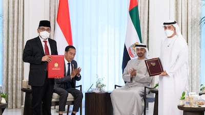 Sheikh Mohamed and Mr Widodo witness an MOU ceremony between the Mohamed bin Zayed University for Humanities and Nahdlatul Ulamab University of Indonesia. Also present were Dr Hamdan Musallam Al Mazrouei, chairman of the Mohamed bin Zayed University for Humanities board of Trustees, right, and Yahya Cholil Staquf, chairman of Nahdlatul Ulamab University of Indonesia executive board.