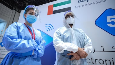 Magham Shrike with fellow healthcare worker at the new Covid-19 Prime Assessment Centre at Adnec. Victor Besa / The National