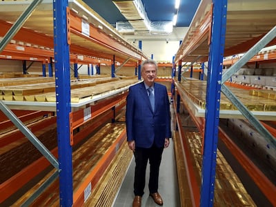 Riad Salameh surrounded by gold bars in the Banque du Liban vault in Beirut. Reuters