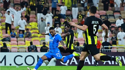 Malcom shoots to score Al Hilal's second goal against Al Ittihad. Reuters