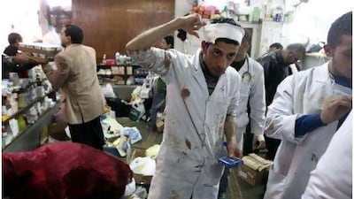 Volunteers struggle to save lives in Cairo, relying on donations of medical supplies, and work while live bullets fly overhead in Tahrir Square, but say they are determined to carry on.