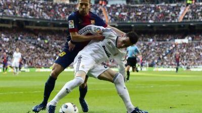 Jordi Alba, left, and his Barcelona teammates will once again battle with Real Madrid and Jose Maria Callejon.