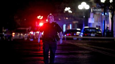 Authorities work at the scene of a mass shooting on Sunday, Aug. 4, 2019, in Dayton, Ohio. AP Photo