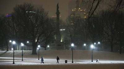Pedestrians walk through Boston Common. Brian Snyder / Reuters