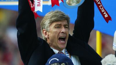 Arsenal manager Arsene Wenger celebrates winning the Premier League in 2002. Getty