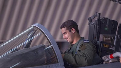 Air force pilot Prince Khaled bin Salman, a son of Crown Prince Salman bin Abdulaziz Al Saud, sits in the cockpit of a fighter jet at an undisclosed location after returning from a mission to Syria. Courtesy Saudi Press Agency/AFP Photo
