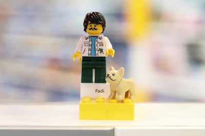 Lego figurines at the new Lego store in The Dubai Mall can be personalised with fonts, pets and more. Photo: Pawan Singh / The National