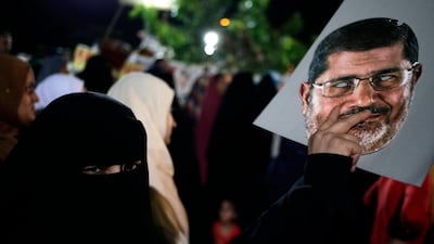 The military intelligence building is several kilometres from the site of the vigil, where thousands of protesters are defying threats by Egypt's army-installed authorities to clear them.