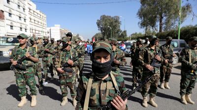 Houthi fighters take part in a parade in Sanaa, Yemen. Reuters