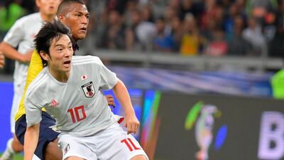 Japan's Shoya Nakajima celebrates after scoring against Ecuador. AFP