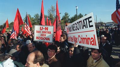 Hundreds of ethnic Albanians from the Serbian province of Kosovo protest against the inclusion of Serbia and its president Slobodan Milosevic in the peace talks between Bosnia, Croatia and Serbia, on November 19, 1995. AFP