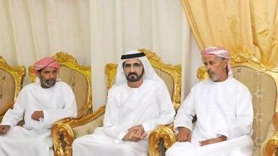 Sheikh Mohammed bin Rashid, Vice President and Ruler of Dubai, offers condolences to Col Saif’s brothers, Rashid Abdulla Al Hajj Al Kaabi, left, and Salem Abdulla Al Hajj Al Kaabi in Al Ain.