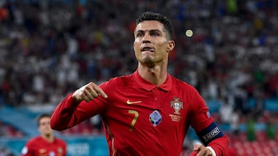 Cristiano Ronaldo of Portugal celebrates aftter he scored a goal during the Portugal vs. France match in the third round of Group F of the Euro 2020 soccer tournament in Puskas Ferenc Arena in Budapest, Hungary, 23 June 2021. EPA