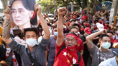 NLD supporters shout slogans outside Myanmar's embassy during a rally after the military seized power from a democratically elected civilian government and arrested its leader Aung San Suu Kyi, in Bangkok, Thailand. Reuters