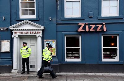 Police closed pizza restaurant Zizzi as part of the investigation into the suspected poisoning of former Russian agent Sergei Skripal. Toby Melville/ Reuters