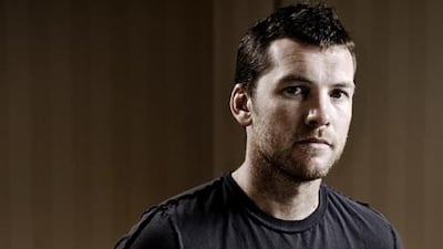Sam Worthington stars in Man on a Ledge, in UAE cinemas today. Kristian Dowling / AP Photo