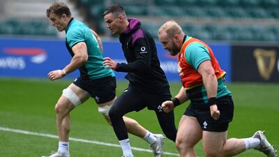 Ireland fly-half Johnny Sexton, centre, takes part in a training session at Twickenham. AFP