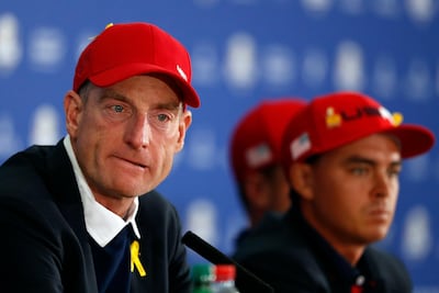 United States captain Jim Furyk, left, led a team that was simply outplayed over three days. AP Photo