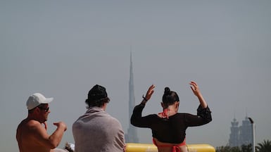 People realx at the Kite Beach with Burj Khalifa in the background, after an Iranian attack, following United States and Israel strikes on Iran, in Dubai, United Arab Emirates, March 1, 2026. REUTERS / Amr Alfiky