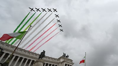 Jets of the Italian Air Force's Tricolor Arrows aerobatic unit spread smoke with the colors of the Italian flag as they fly over Rome's Altare della Patria monument as part of celebrations of National Unity and Armed Forces Day, marking the end of the First World War. AFP