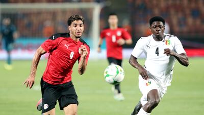 Omar Marmoush, left, and Saidou Sow chase after the ball. EPA