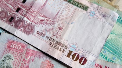 Of the $321.4bn of bonds and sukuk maturing over the next 10 years, $197.1bn is denominated in US dollars with the remainder in other local and global currencies. Ryan Carter / The National