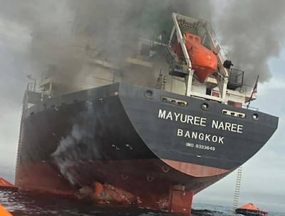 The cargo ship Mayuree Naree on fire after being hit by Iranian missiles in the Strait of Hormuz. EPA