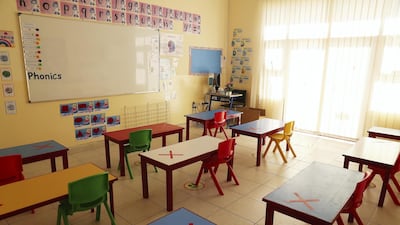 Distanced tables in the classrooms.