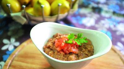 Ful medames or foule mudammes is an Egyptian dish of cooked fava beans served with vegetable oil, cumin, and optionally with chopped parsley, garlic, onion, lemon juice, and chili pepper. Fatima Al Marzooqi / The National