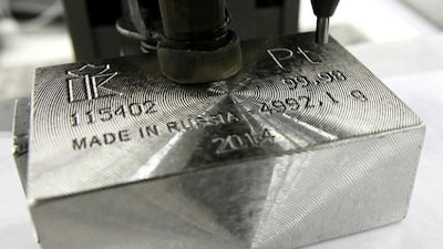 A machine engraves information on an ingot 99.98 per cent pure platinum at the Krastsvetmet. The company says 2025 platinum production would be expanded to 154 tonnes. Ilya Naymushin / Reuters