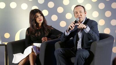 Actor Kevin Spacey speaks as actress Priyanka Chopra, left, looks on as they meet Bollywood actors. Celebrities and dignitaries from India and the United States descended on Florida this week for the Bollywood Oscars, an awards event making its first-ever US stop with the aim of creating deeper ties between the two countries. Mohammed Jaffer-Snaps / Reuters