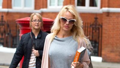 Pamela Anderson delivers lunch to Julian Assange at Embassy of Ecuador. Ben A. Pruchnie / Getty Images