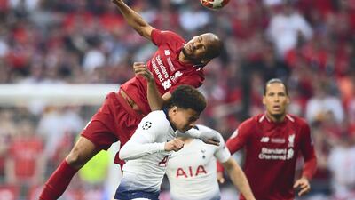 Fabinho, top, goes for a header against Tottenham. Getty