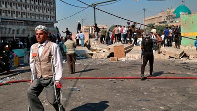 Anti-government protesters gather during ongoing demonstrations, in downtown Baghdad Iraq. AP Photo