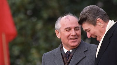 FILE - U. S. President Ronald Reagan, right, talks with Soviet leader Mikhail Gorbachev during arrival ceremonies at the White House where the superpowers begin their three-day summit talks in Washington, D. C. , Tuesday, Dec. 8, 1987. Russian news agencies are reporting that former Soviet President Mikhail Gorbachev has died at 91. The Tass, RIA Novosti and Interfax news agencies cited the Central Clinical Hospital. (AP Photo / Boris Yurchenko, File)