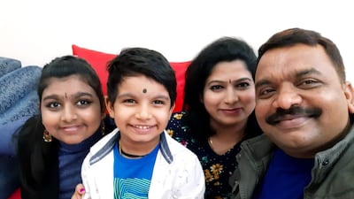 Shivamurthy Gali Krishnappa, right, with his wife and children. Courtesy: Mr Krishnappa