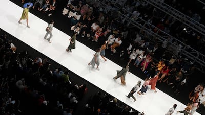 Models present creations by Maslea during Kuala Lumpur Fashion Week in Kuala Lumpur. AFP