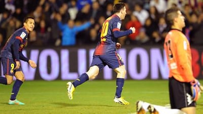 Barcelona's Lionel Messi celebrates his goal against Real Valladolid.