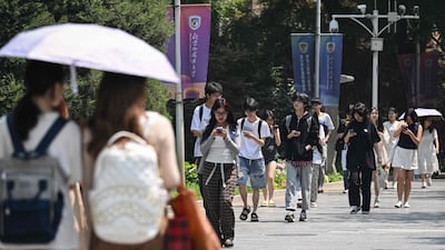 Chinese students on the campus of Beijing Foreign Studies University in Beijing. AFP