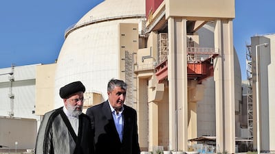 Iran's President Ebrahim Raisi, left, and chief of the Atomic Energy Organisation of Iran Mohammad Eslami on a visit to the Bushehr Nuclear Power Plant. AFP