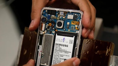 A Samsung Note 7 is positioned for tests. Edgar Su / Reuters